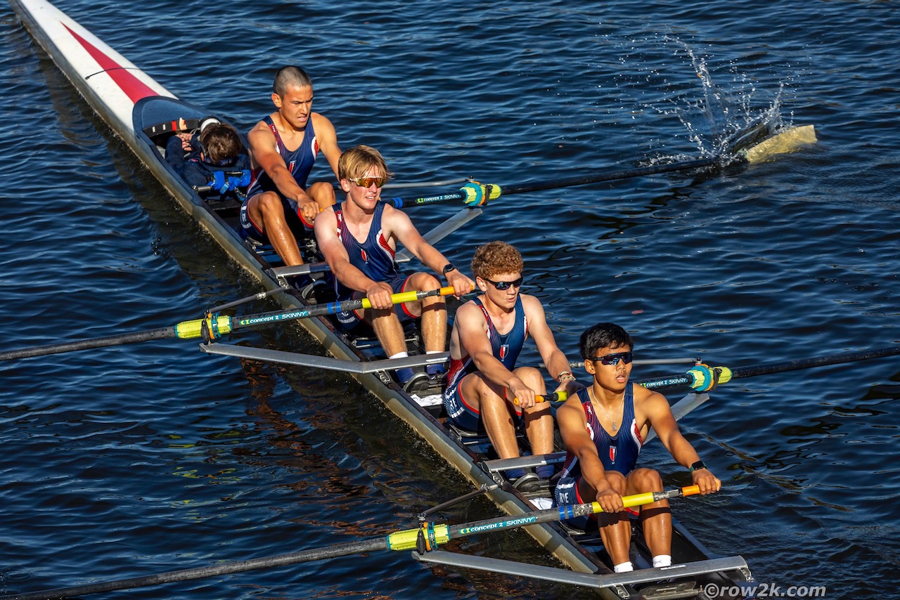 RowAmerica Rye teammates racing together on the water.